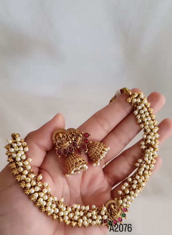 "Temple Heritage: Gold-Toned Pearl Choker & Jhumka Set