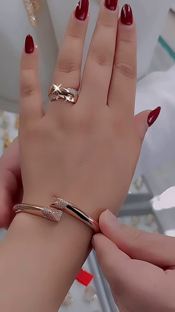 Elegant Rose Gold Bangle Bracelet and Ring Set with Delicate Accents - Image 2